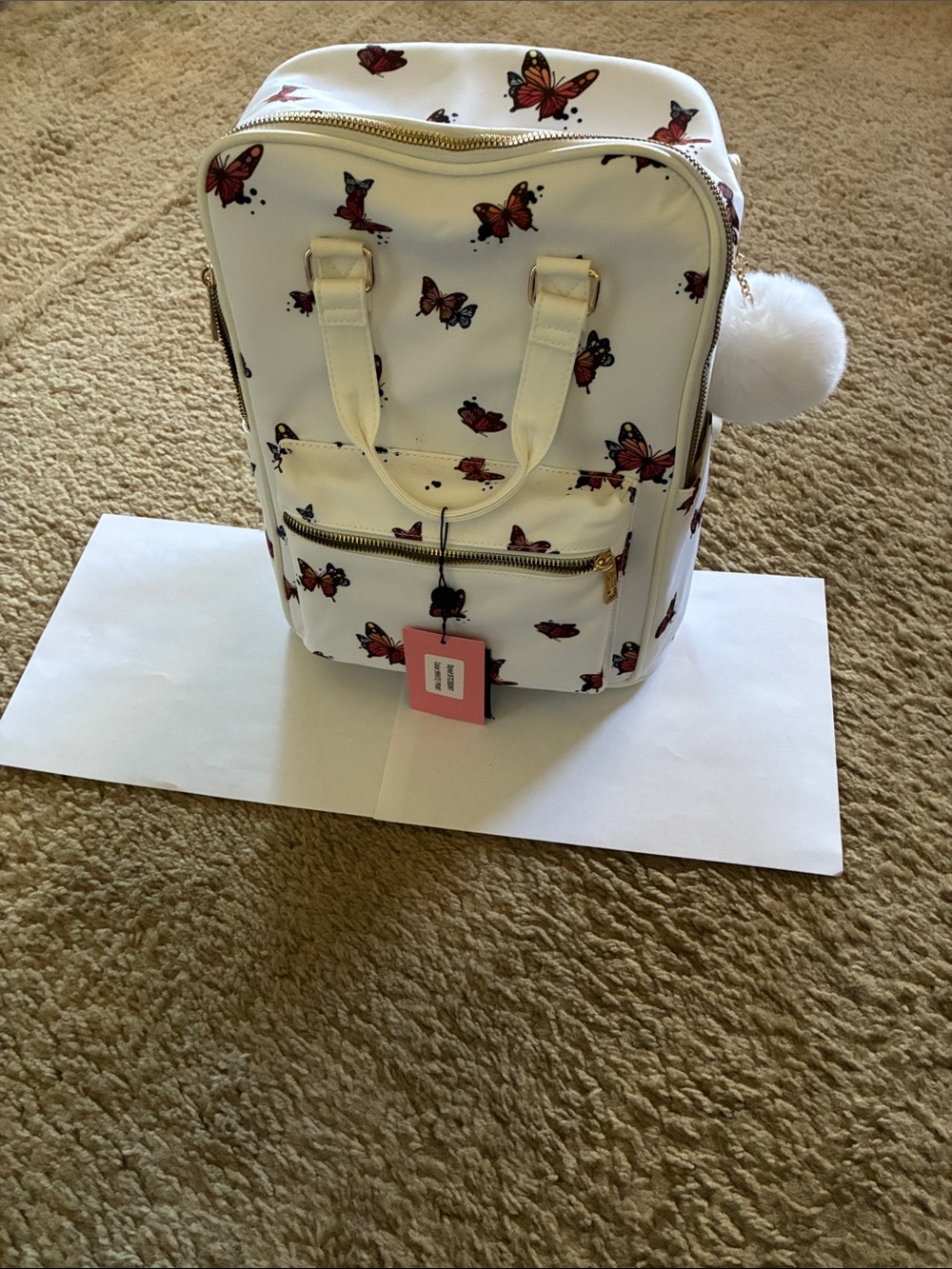 White Butterfly-Print Mini Backpack with Pom Charm